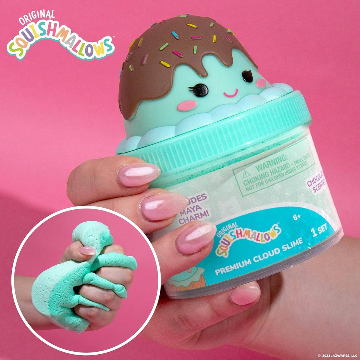 Teal and brown ice-cream cloud slime jar with smiling character lid, held in hand