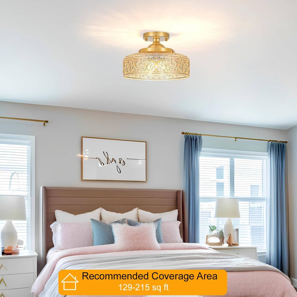 Gold semi-flush ceiling light with ornate glass shade centered over bedroom