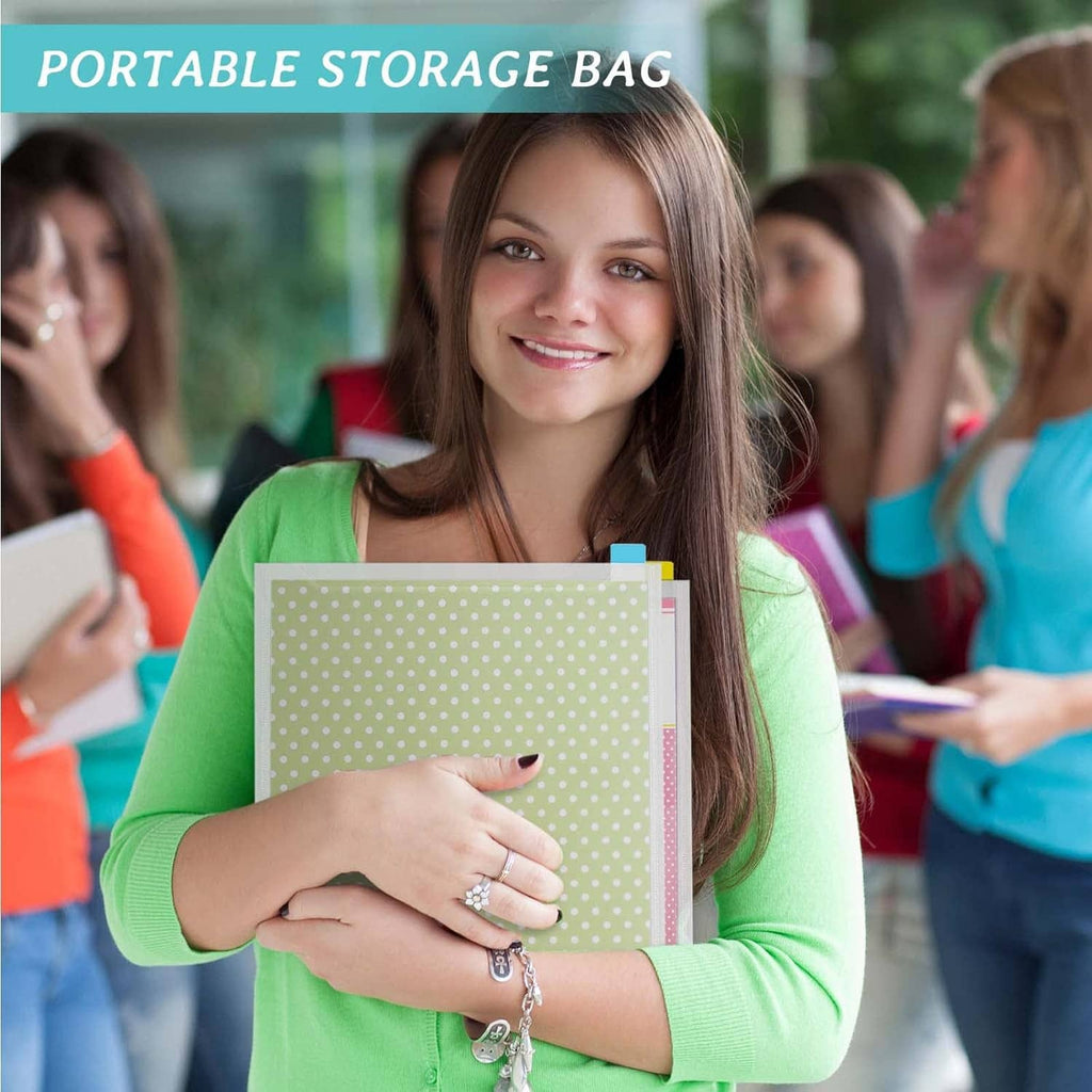 Portable storage bag holding a scrapbook paper storage organizer
