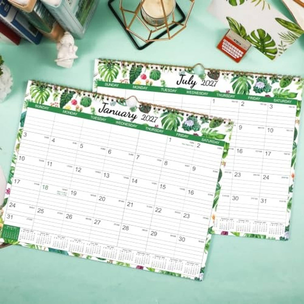 Dual wall calendar pages showing January 2027 and July 2027 with date grids