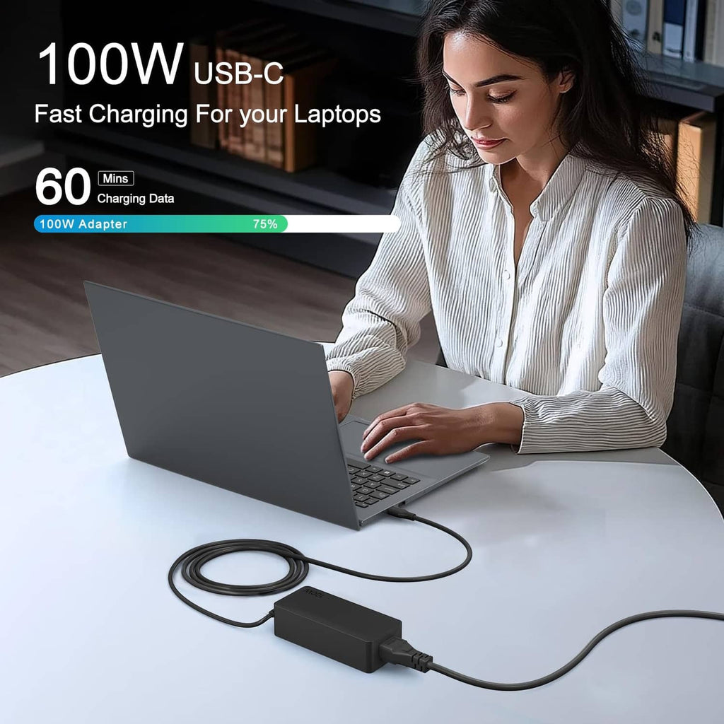 Black 100W USB-C charger with cable plugged in to laptop