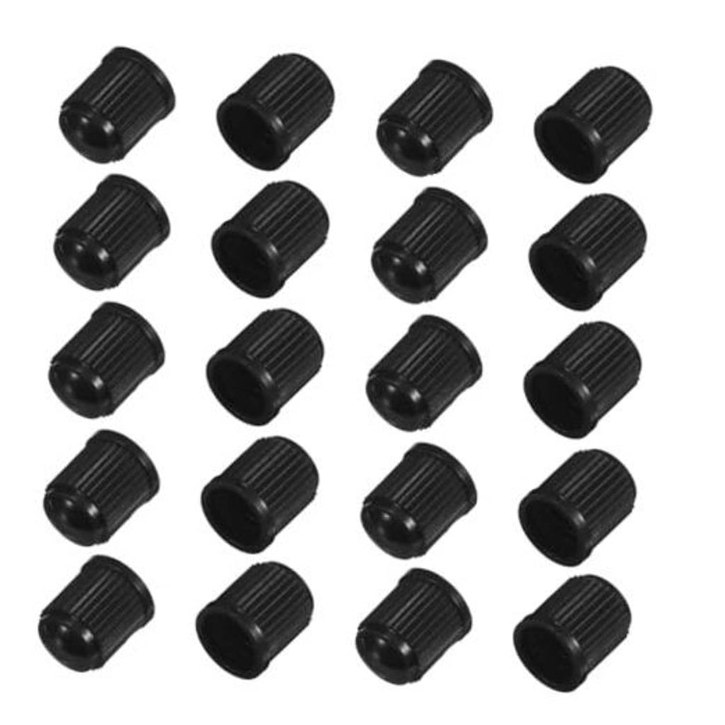 Multiple black ribbed tire valve dust caps arranged in a grid