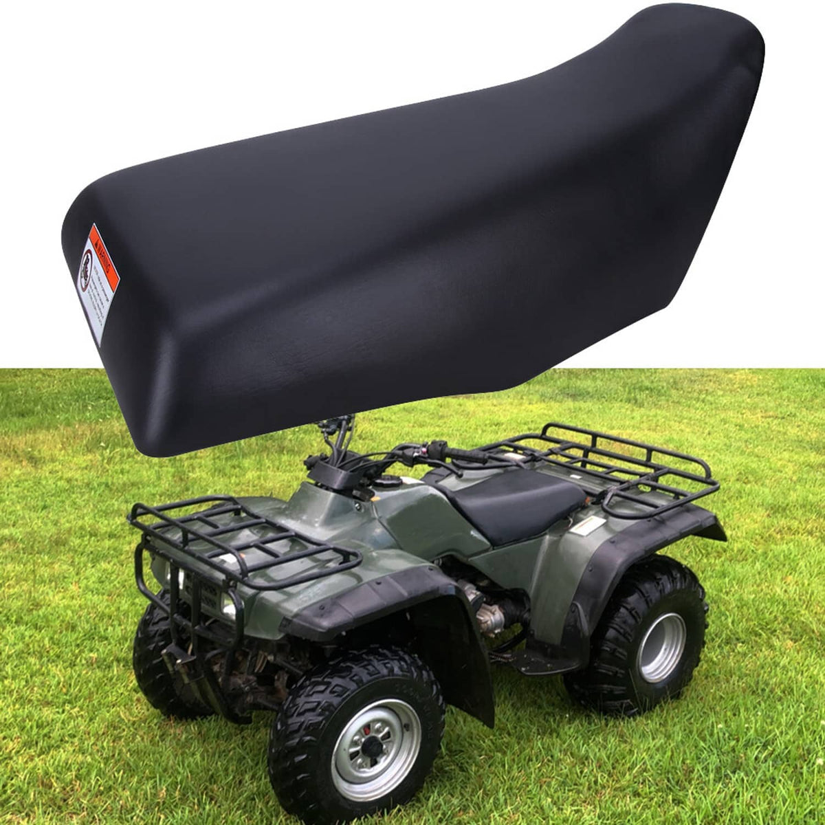 Black ATV replacement seat with smooth contoured top and side warning label