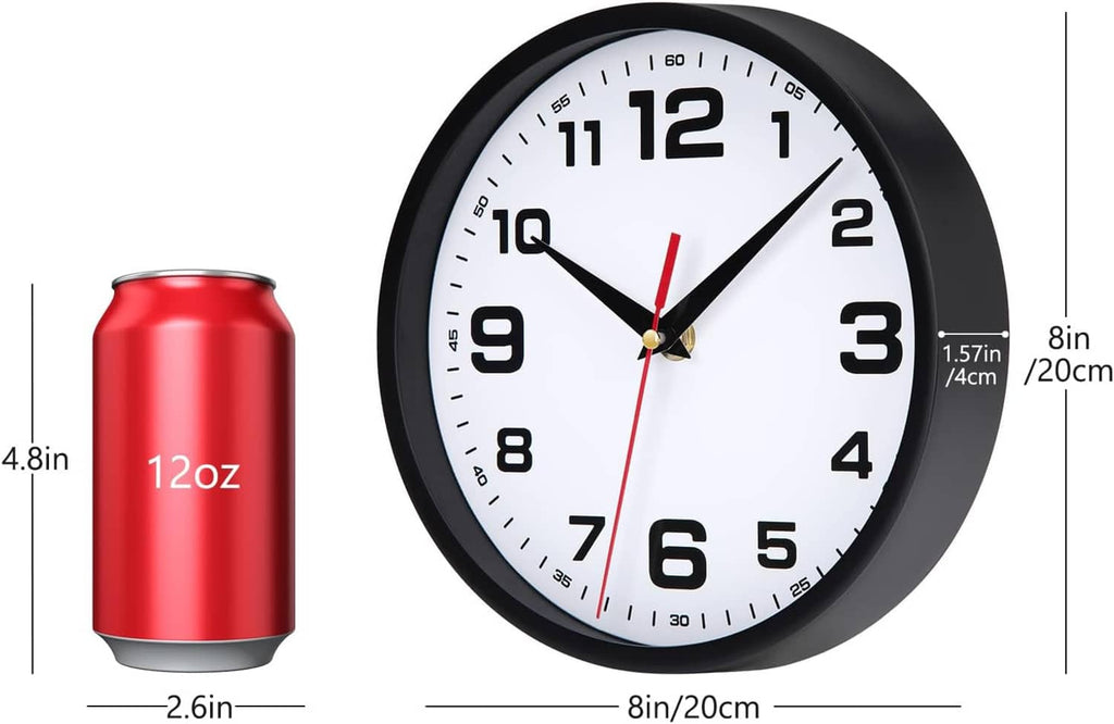 Black-framed analog wall clock with white face, bold numerals, and red hands