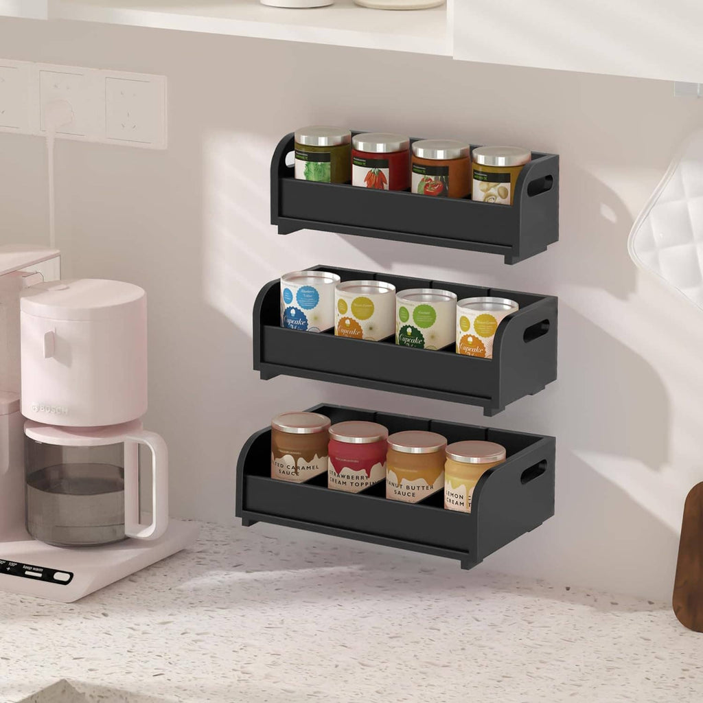 Black tea bag organizer with three wall-style shelves for jars and tea bags
