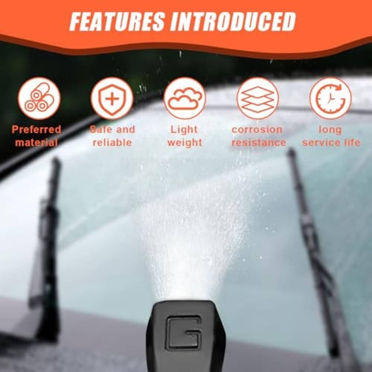 Car windshield washer sprayer nozzle dispensing a fan-shaped water spray from black housing