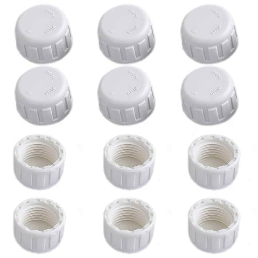 Twelve white PVC pipe end cap plugs with open threaded ports