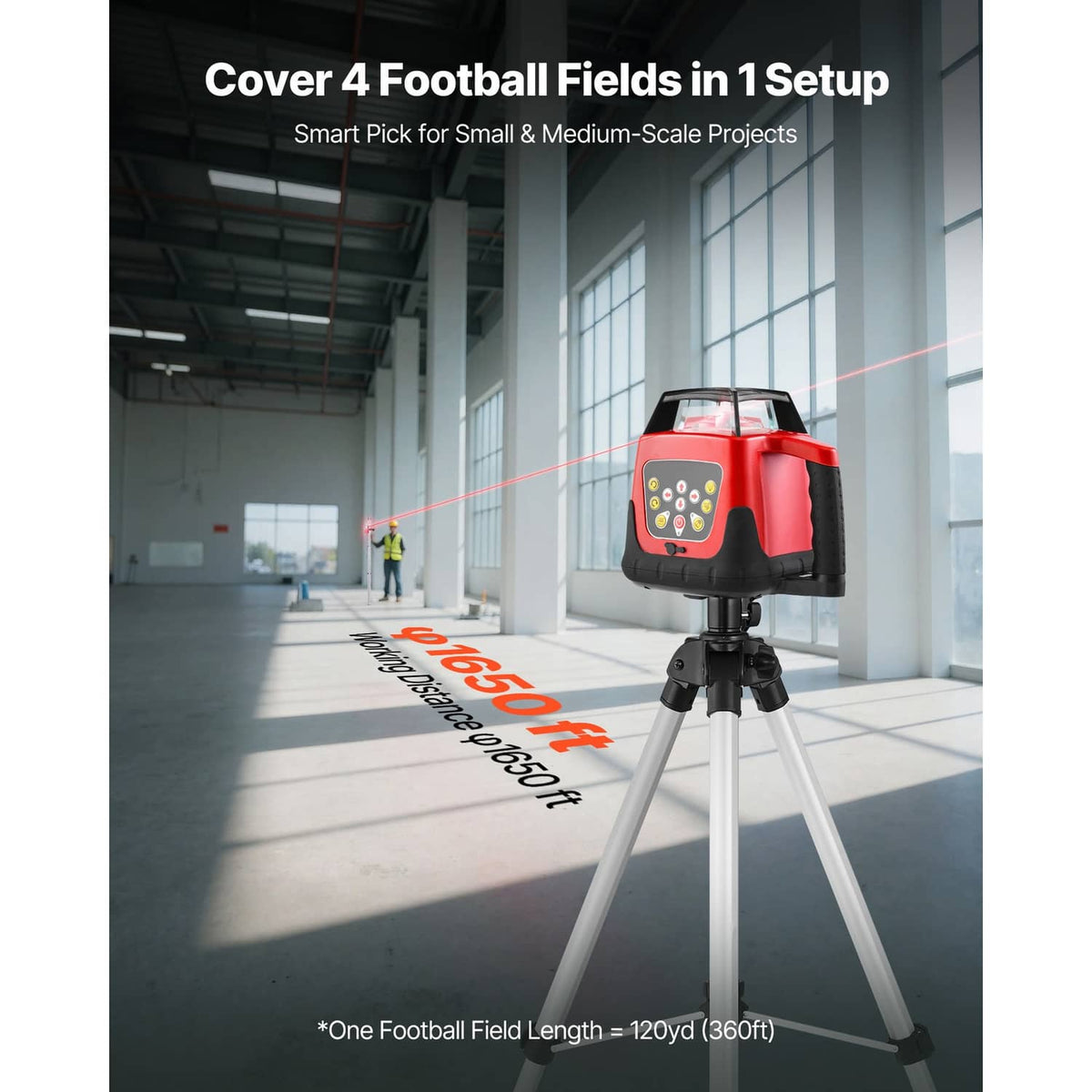 Red 360 laser level on tripod projecting a red line in a large indoor work space