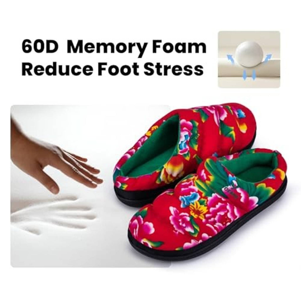 Floral slip-on slippers with red upper, green inner lining, and cushioned dark sole.