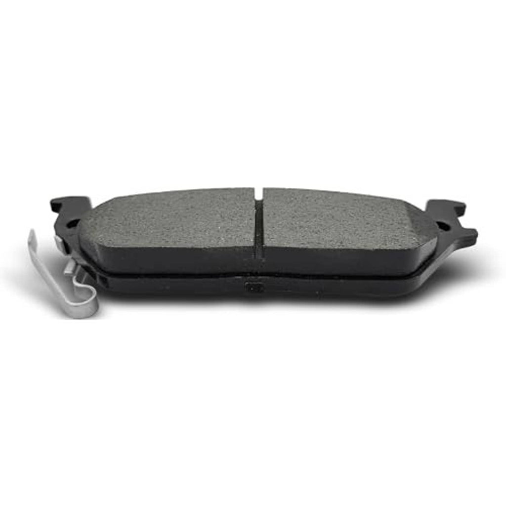Ceramic brake pads with gray friction faces and metal spring clips, front view