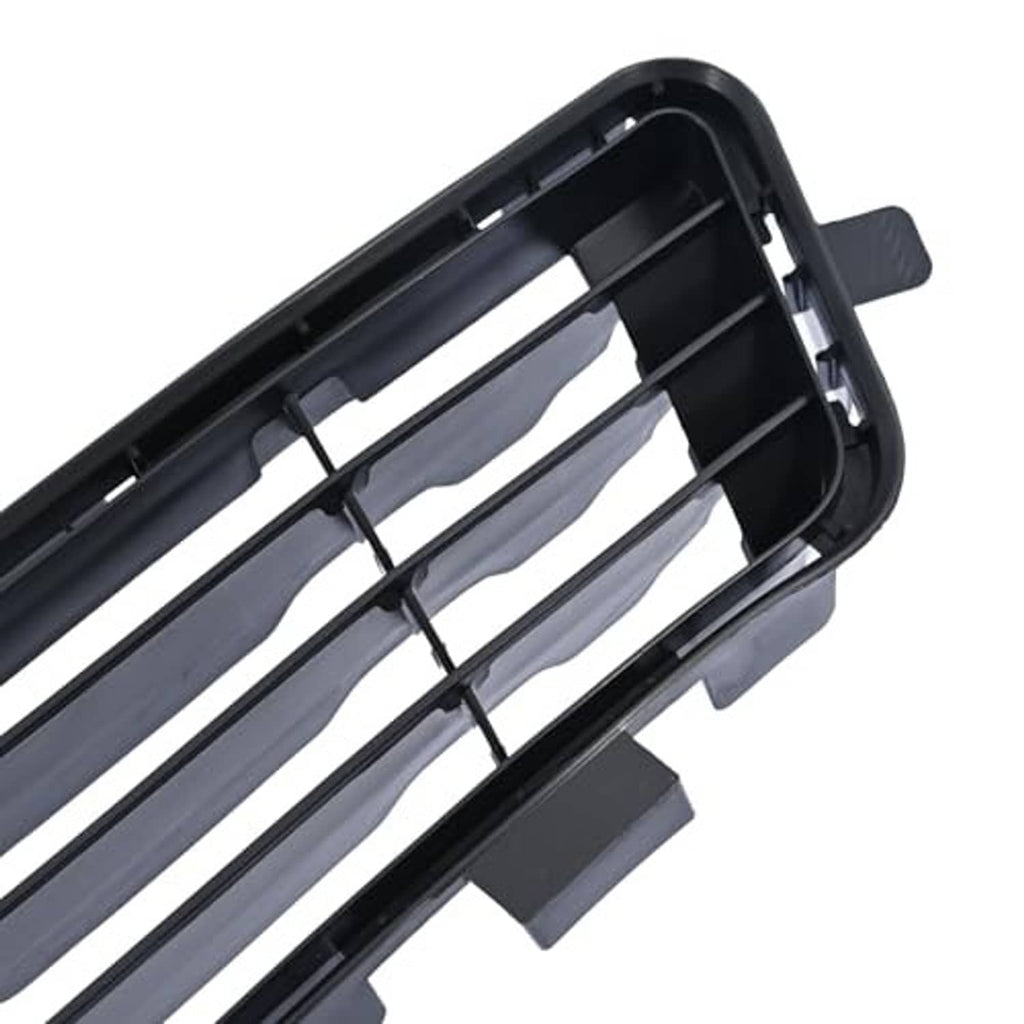 Front grille close-up showing black frame, silver bars, and mounting clips
