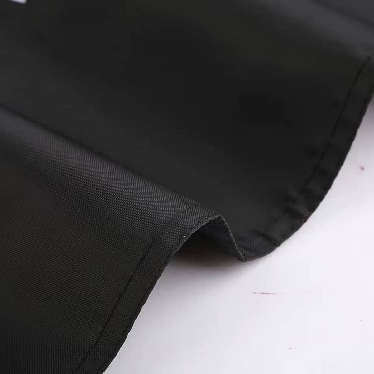 Black flag hem with stitched edge for hanging