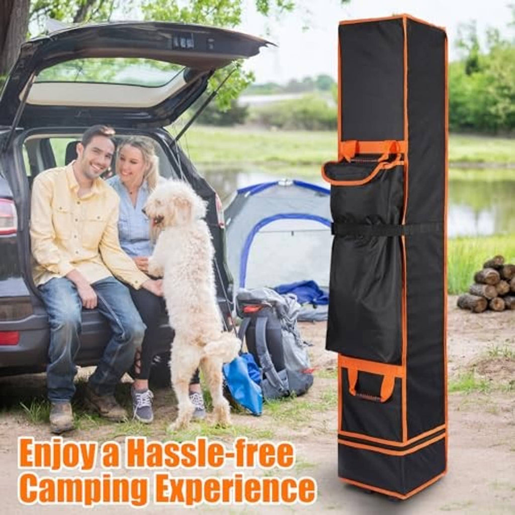 Black and orange wheeled canopy storage bag with front pouches and padded handle, upright.