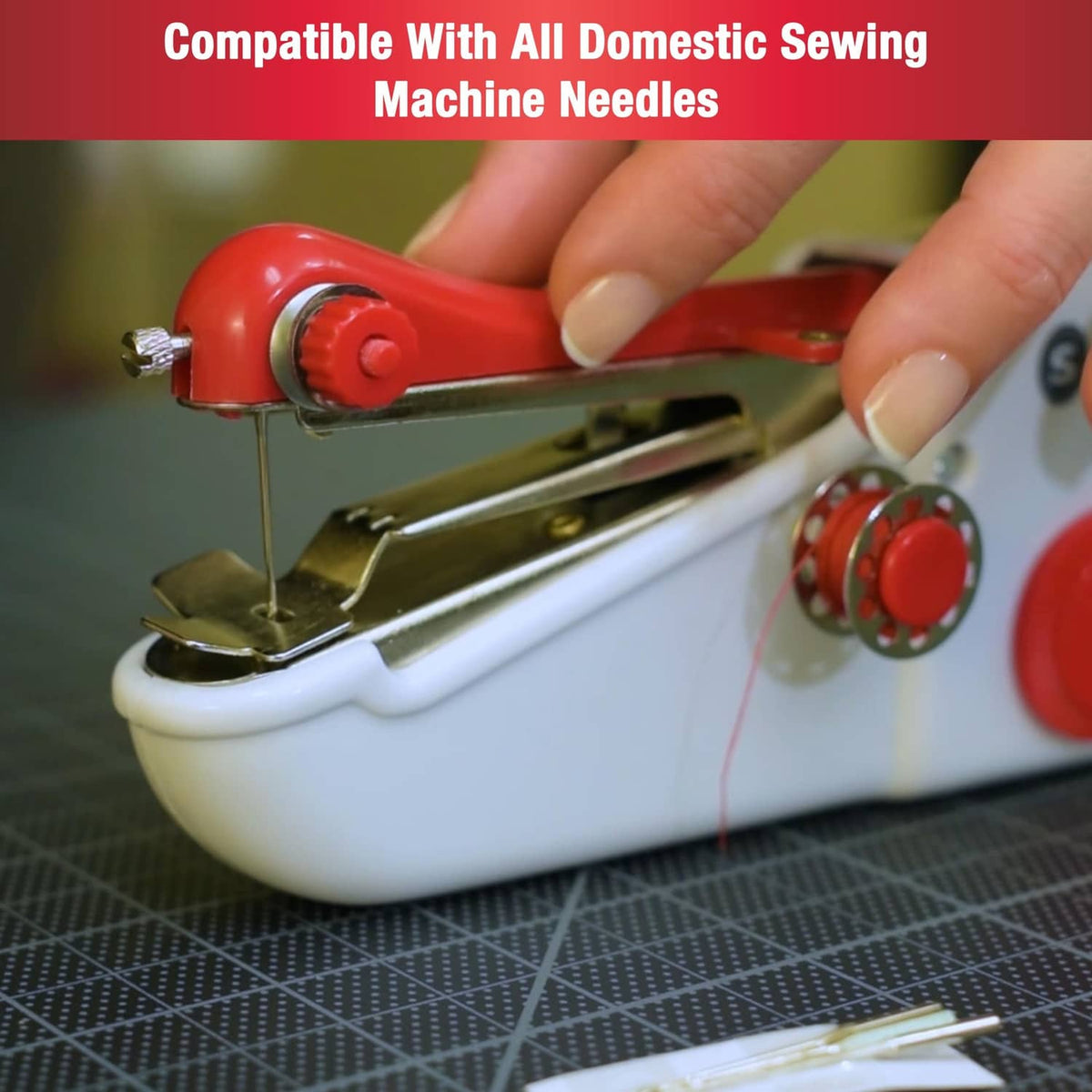 SINGER Stitch Sew Quick handheld sewing machine stitching on dark grid fabric