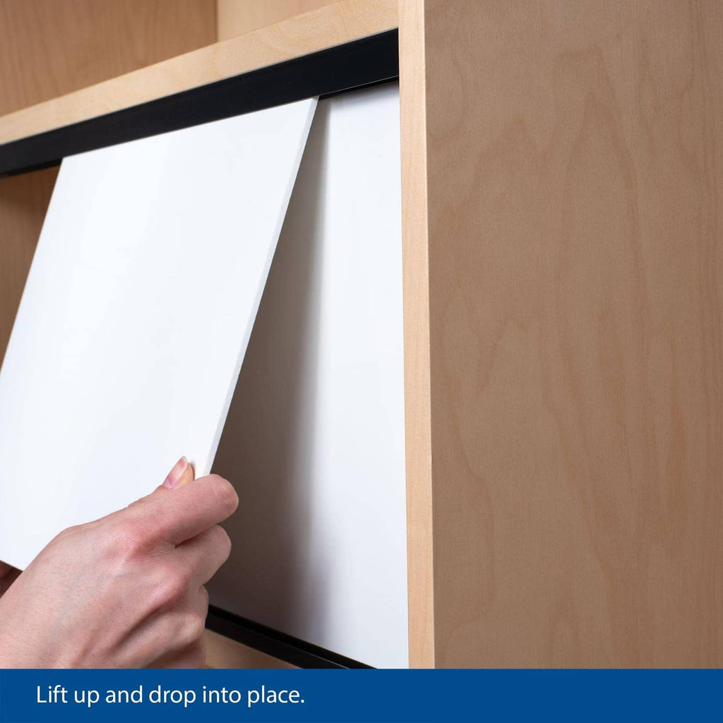 Person lifting and lowering a sliding door panel into the black track