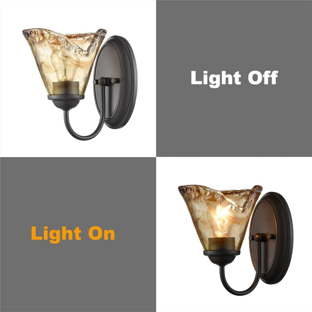 Vintage wall sconce with amber art glass shade showing light on and light off views