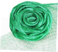 Green and white bird netting roll, tightly coiled garden protection mesh sheet