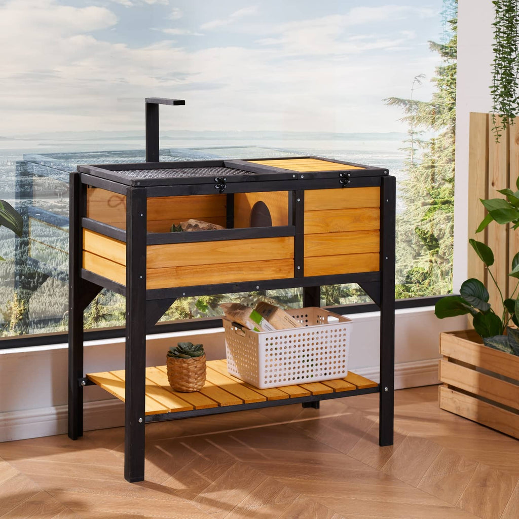 Wooden reptile habitat with black frame, mesh top cover, and front opening compartment
