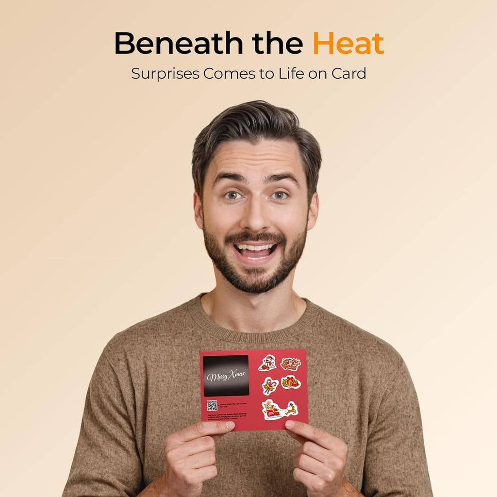 Hand warmer gift card held by person, featuring red icons and design