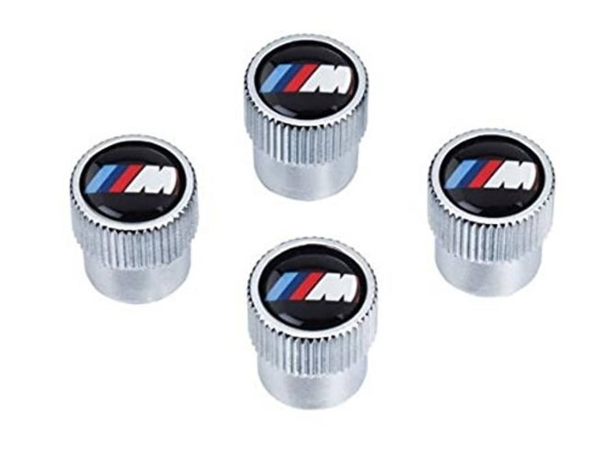 Four silver BMW M logo tire valve stem caps with knurled sides