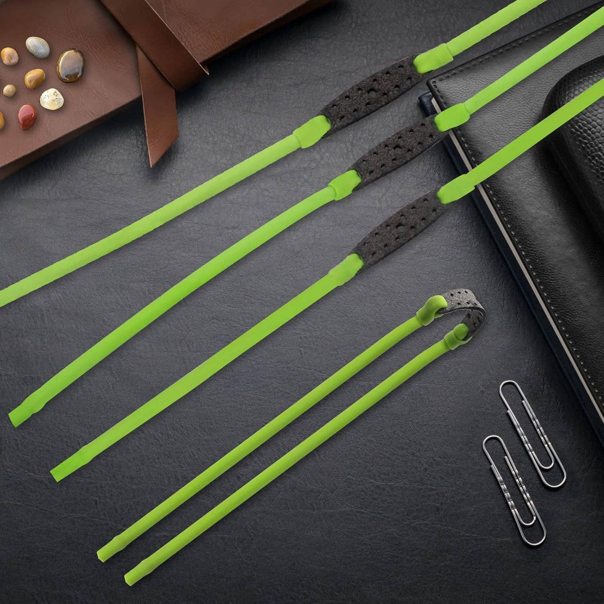 Neon green replacement slingshot bands with black connector tabs, 4-piece set