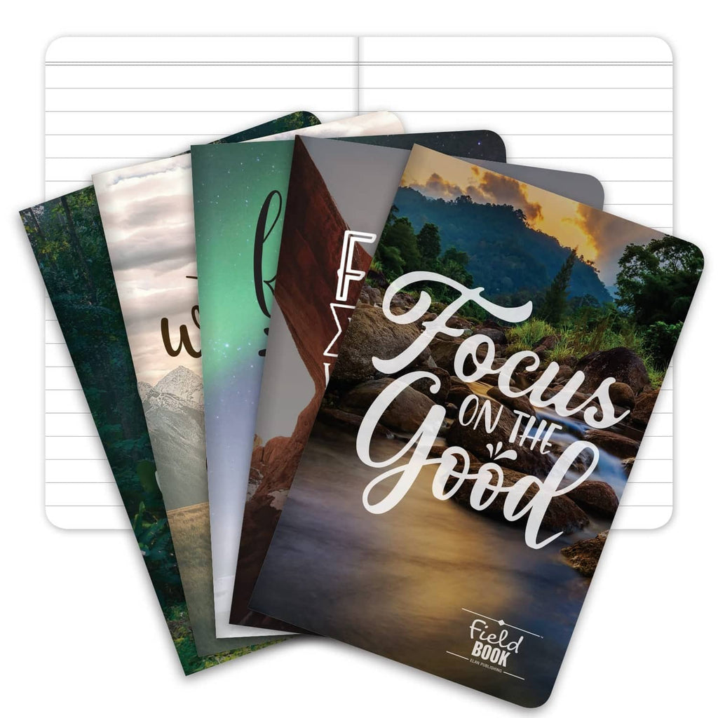 Mini field notebooks stacked, with inspirational photo covers and motivational word art.