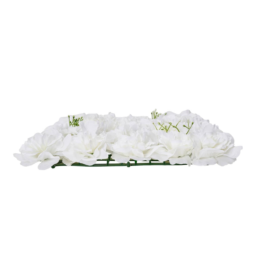 White artificial flower wall panel with layered blooms and green stems, side view