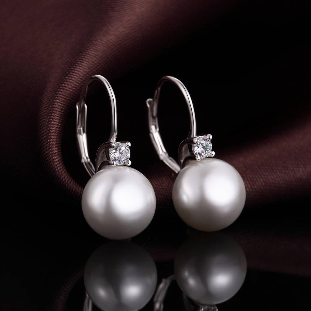 Sterling silver pearl leverback earrings with large round white pearls and clear crystal accents