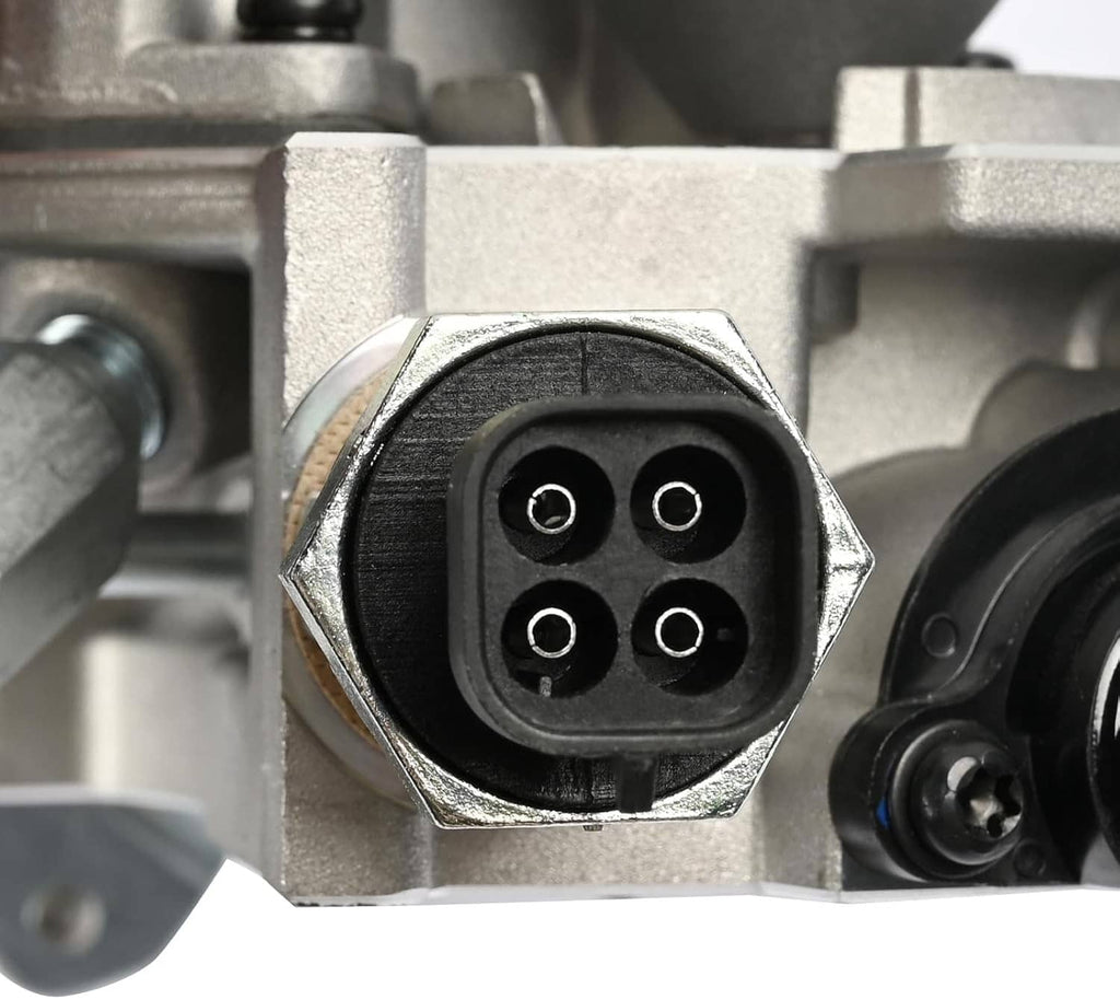 Throttle body electrical connector port with four terminals, silver metal housing.