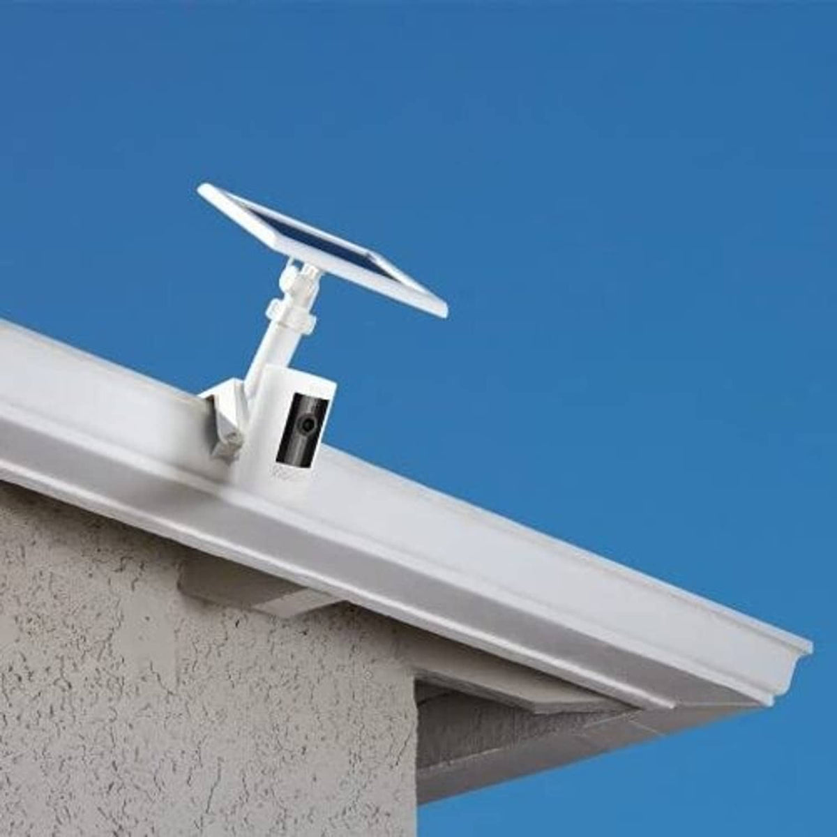 White gutter mount installed on gutter edge, adjustable camera mounting bracket
