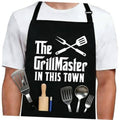 Black apron front panel with grill-themed logo, worn over a white T-shirt.