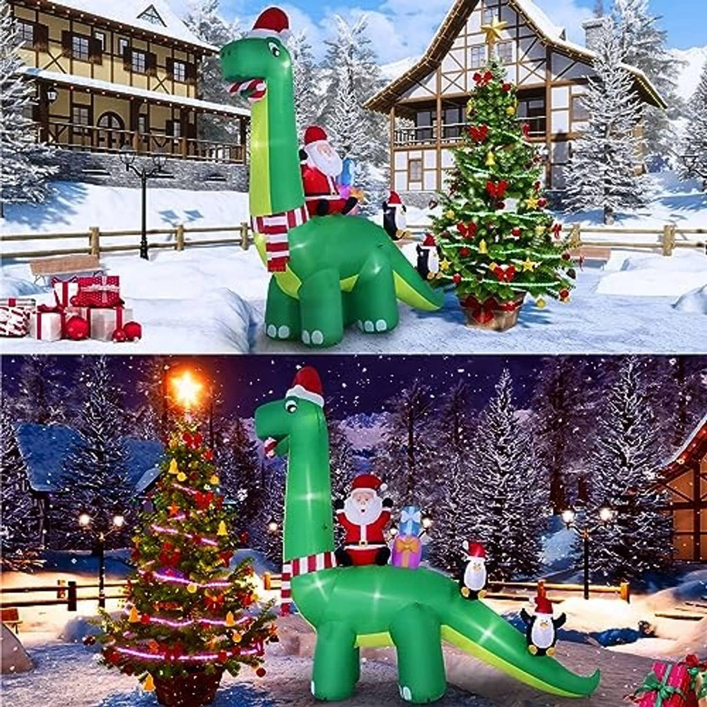 Green 13ft inflatable dinosaur outdoor decoration with Santa and penguins, two-scene view