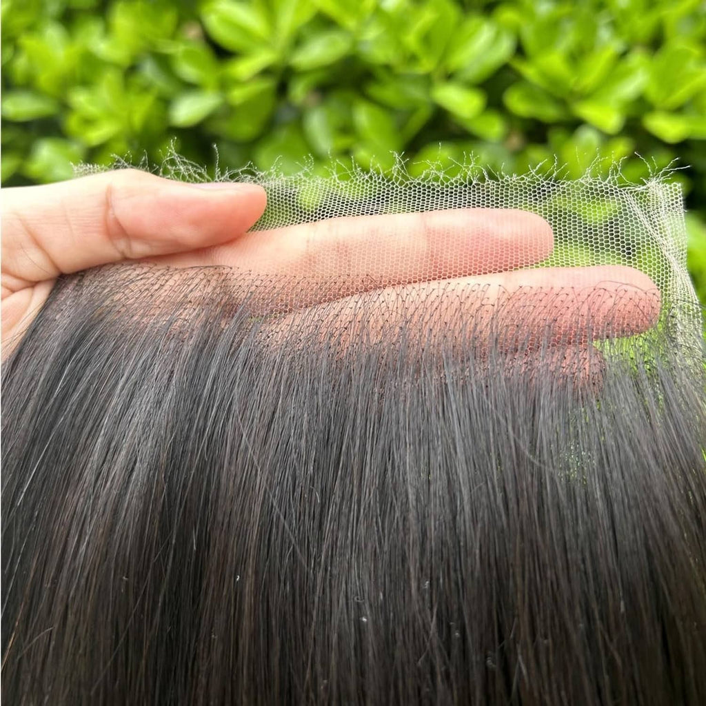 HD lace closure with sheer mesh and straight black hair strands attached