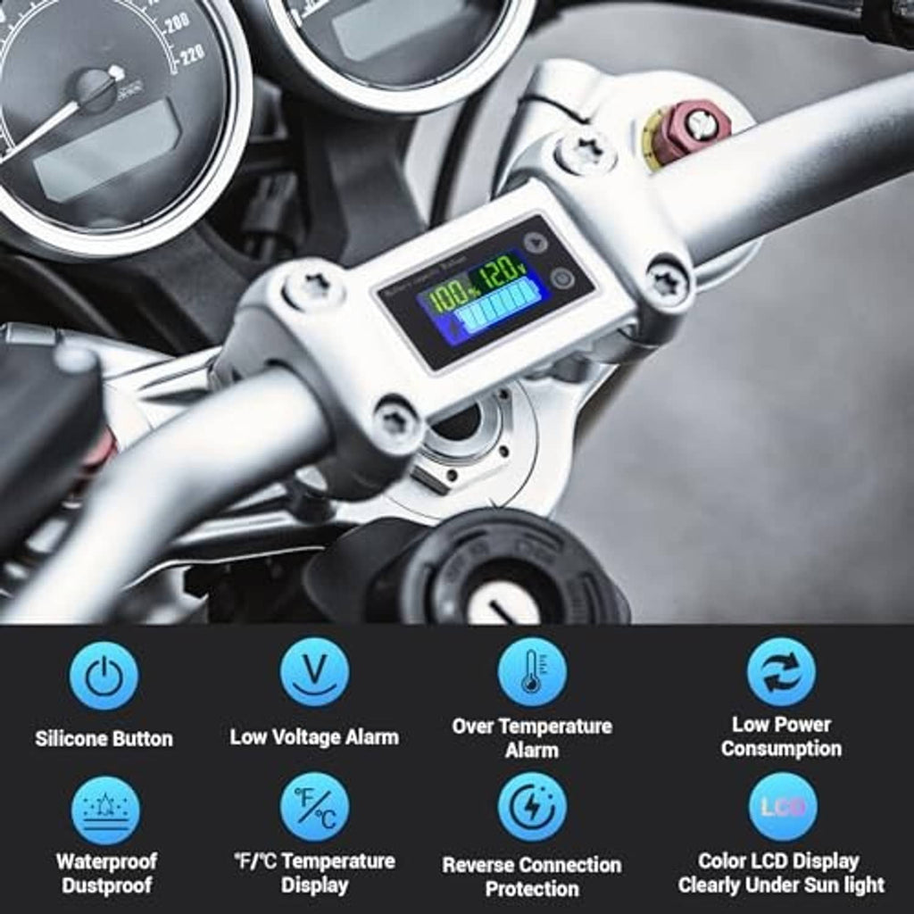 Battery monitor module mounted on handlebar with green LCD display showing voltage