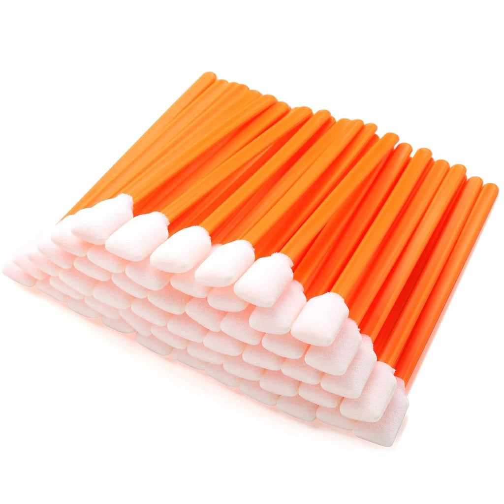 Orange foam cleaning swabs with white rectangular tips, shown from the side.