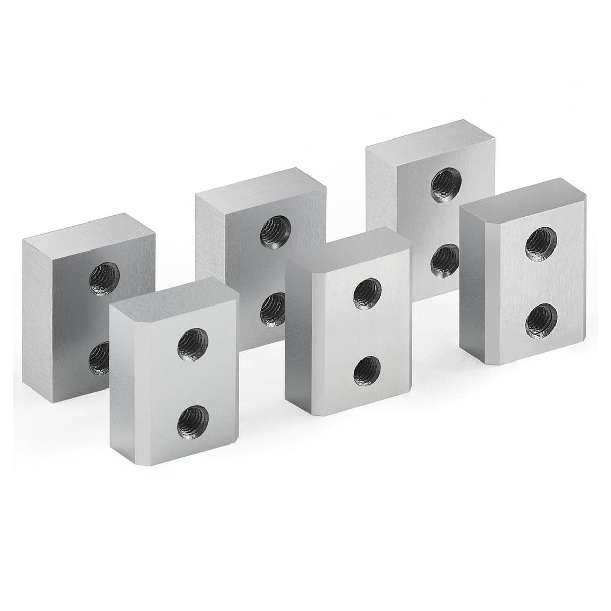 Assorted rebar cutter blade blocks with threaded holes, gray metal pieces for mounting.