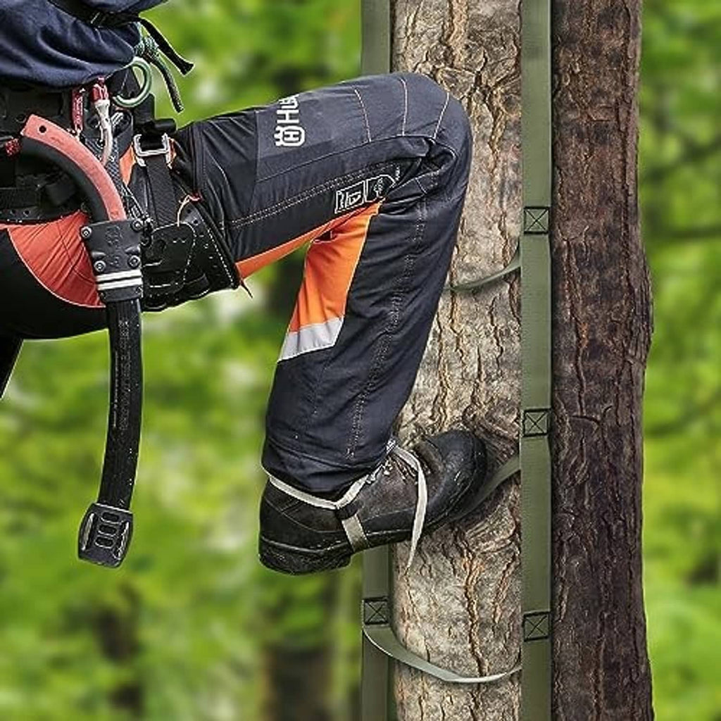 Climbing stick aider attached to a tree step with hanging foot loops