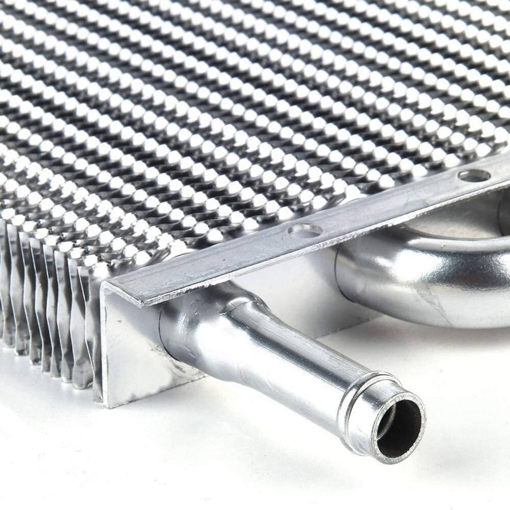 Close-up of aluminum tube-and-fin oil cooler end tank and inlet/outlet pipe
