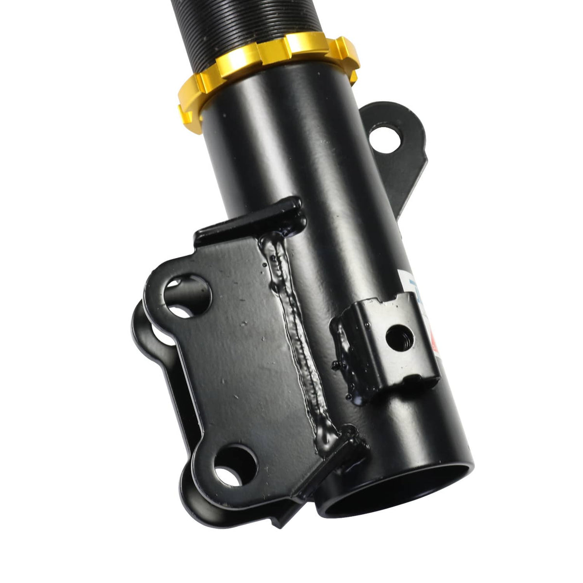 Close-up of black coilover shock bracket and mounting plate