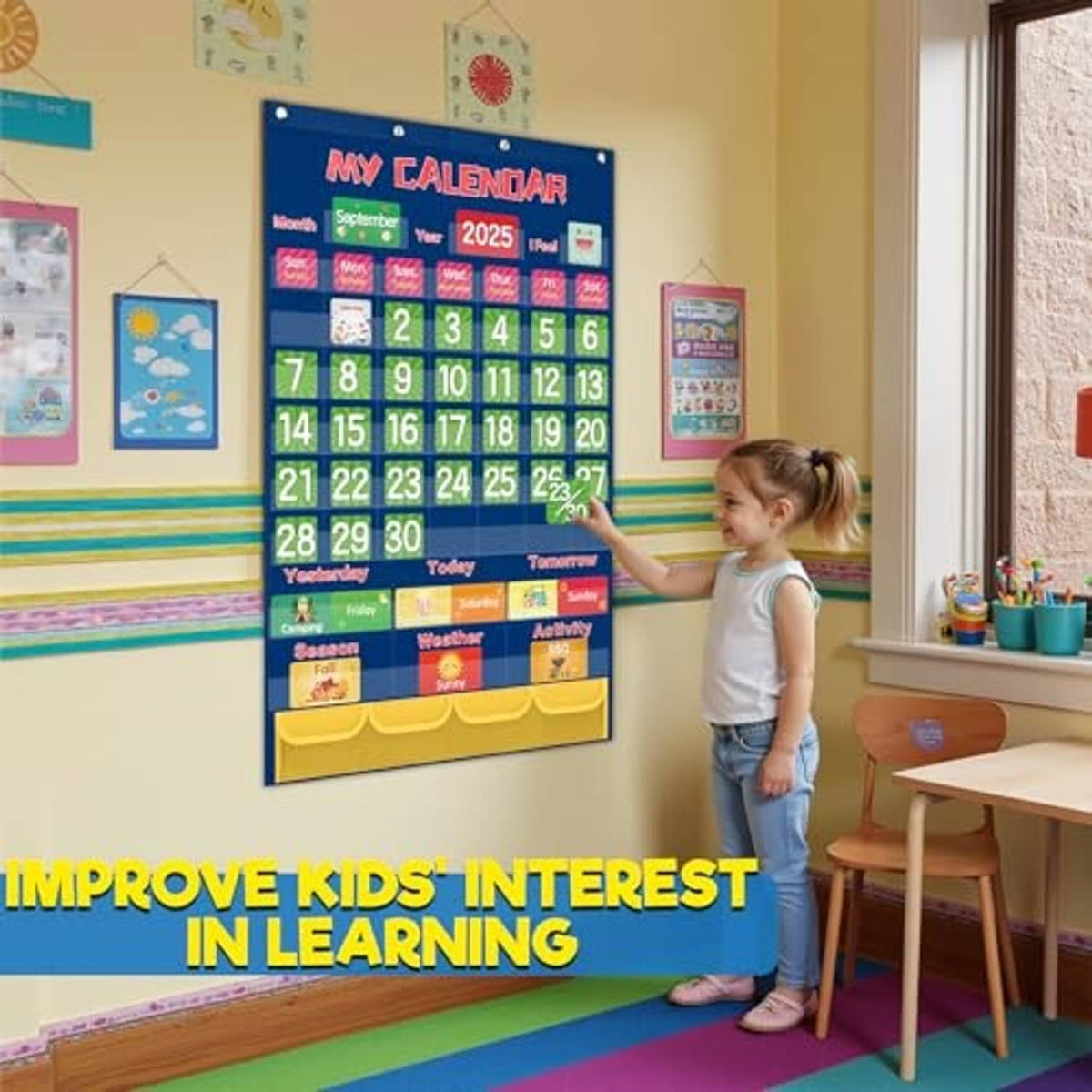 Blue classroom pocket calendar chart on wall with 2025 date grid and labeled category pockets
