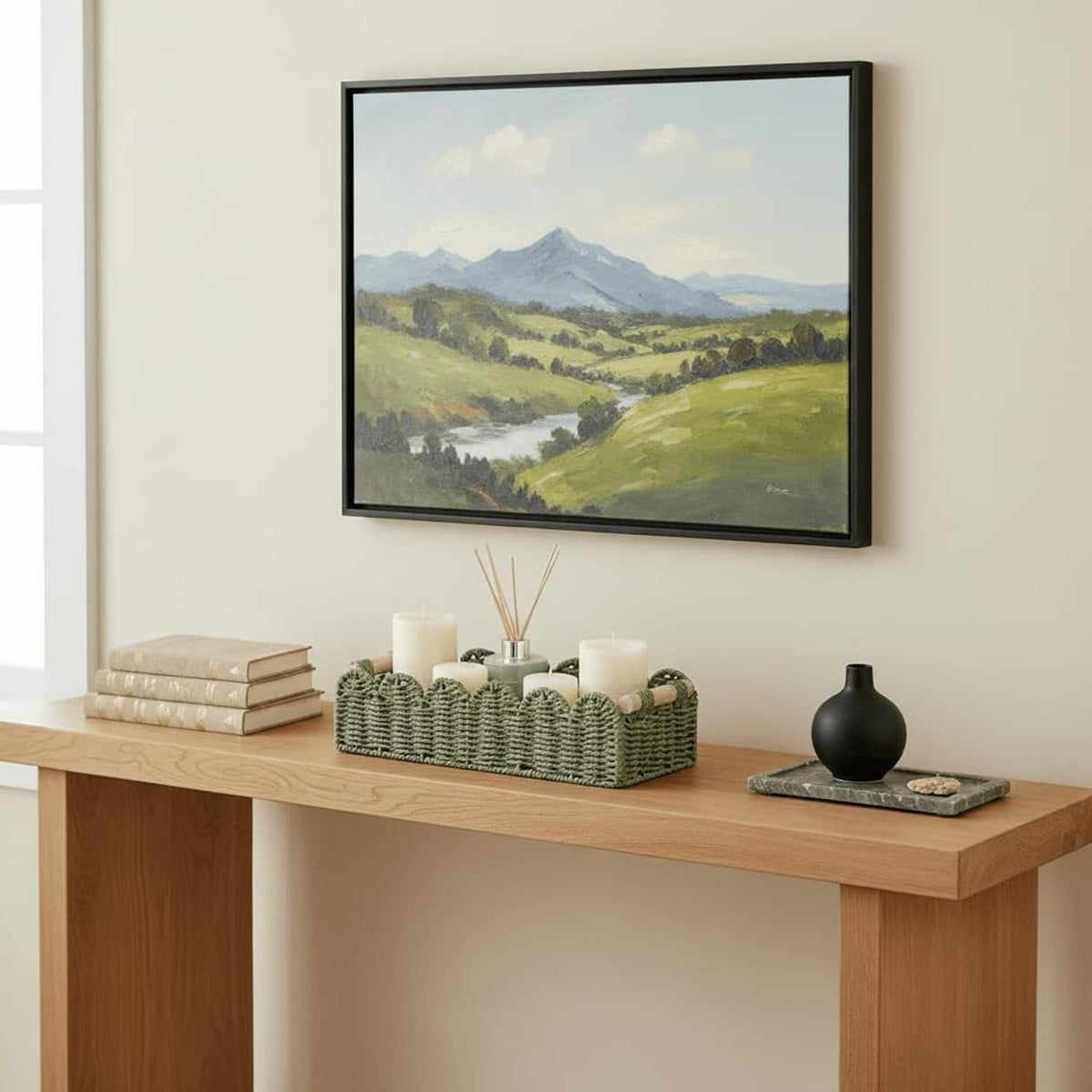 Green woven scalloped storage basket with wood handles on console table