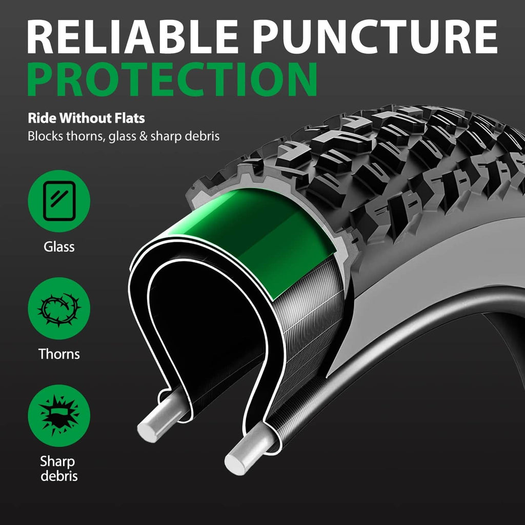 Fat bike tire liner showing green TPU puncture shield around tire.