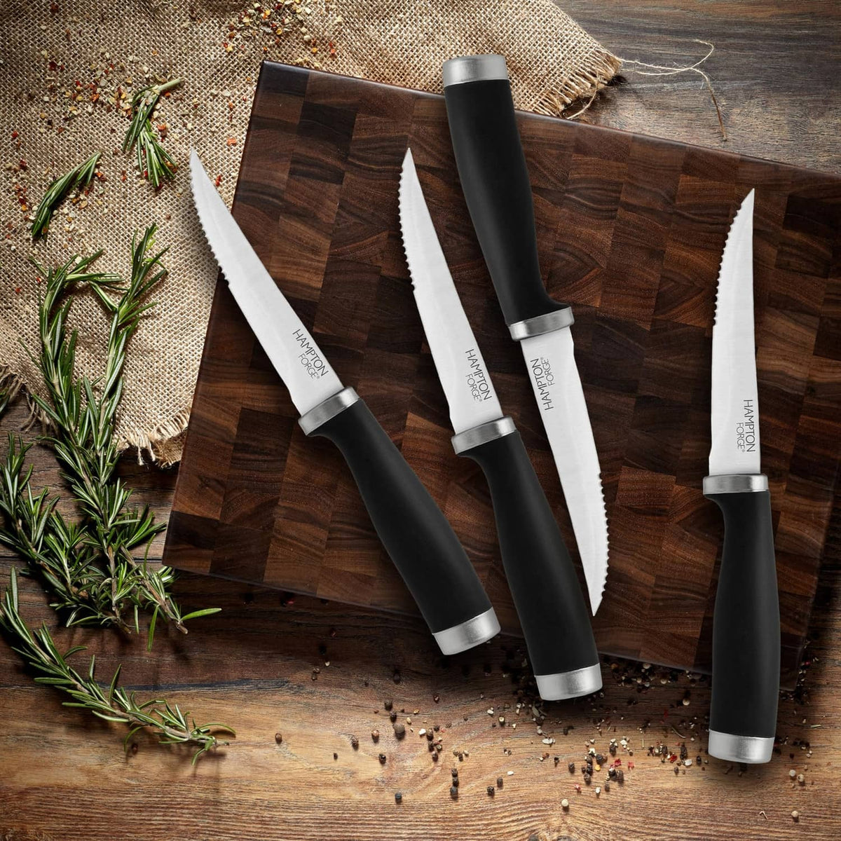 Hampton Forge steak knives set of 4 with black handles and silver serrated blades