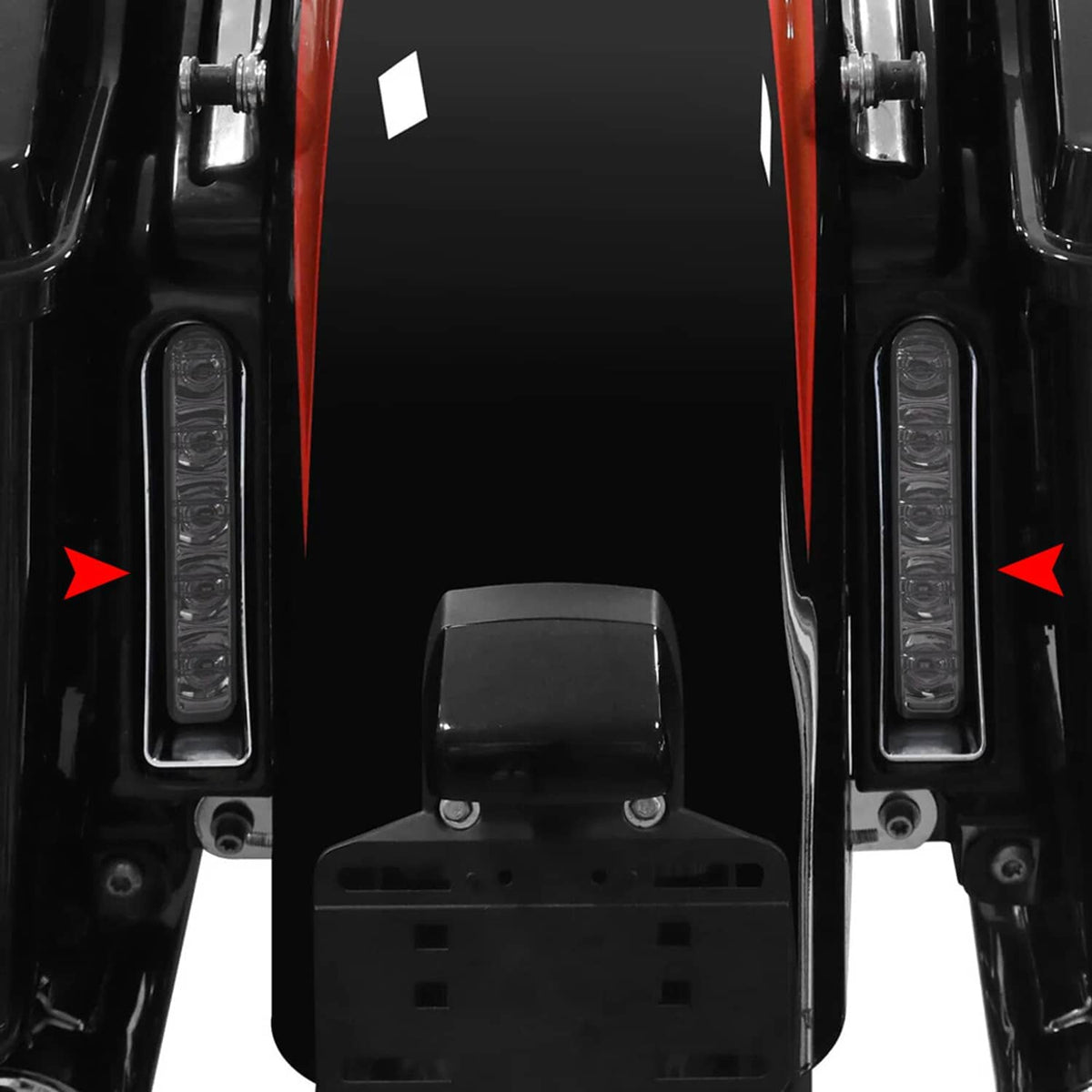Saddlebag LED filler lights installed on motorcycle side filler panel housings