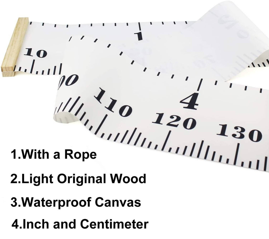 Rolled canvas growth chart height ruler with black inch and cm numbers and wood top.
