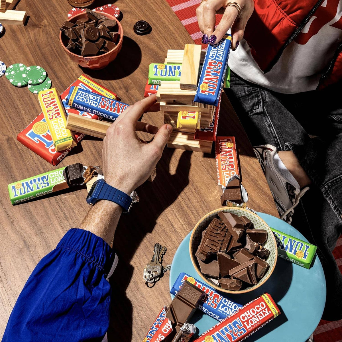 Tony’s Chocolonely chocolate bars with caramel and sea salt, multiple packages on table