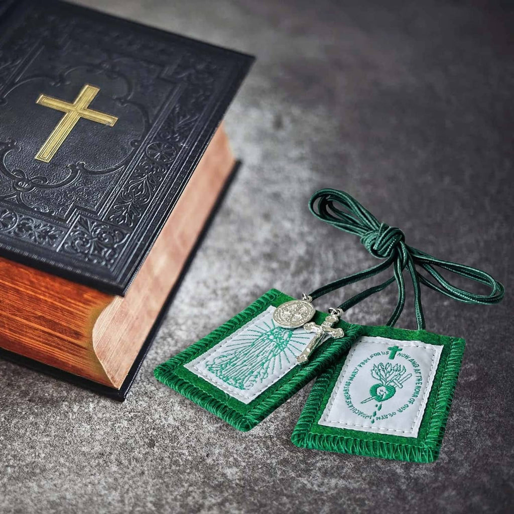 Green cloth scapular set with circular medal and cross charms on green cords