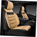 Faux leather car seat covers, front pair, beige with black bolsters and quilted panels
