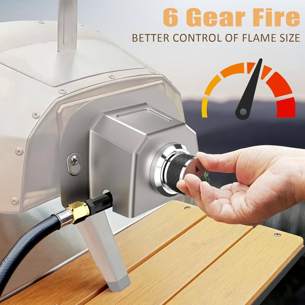 Gas burner attachment with white casing and hand turning the flame control knob