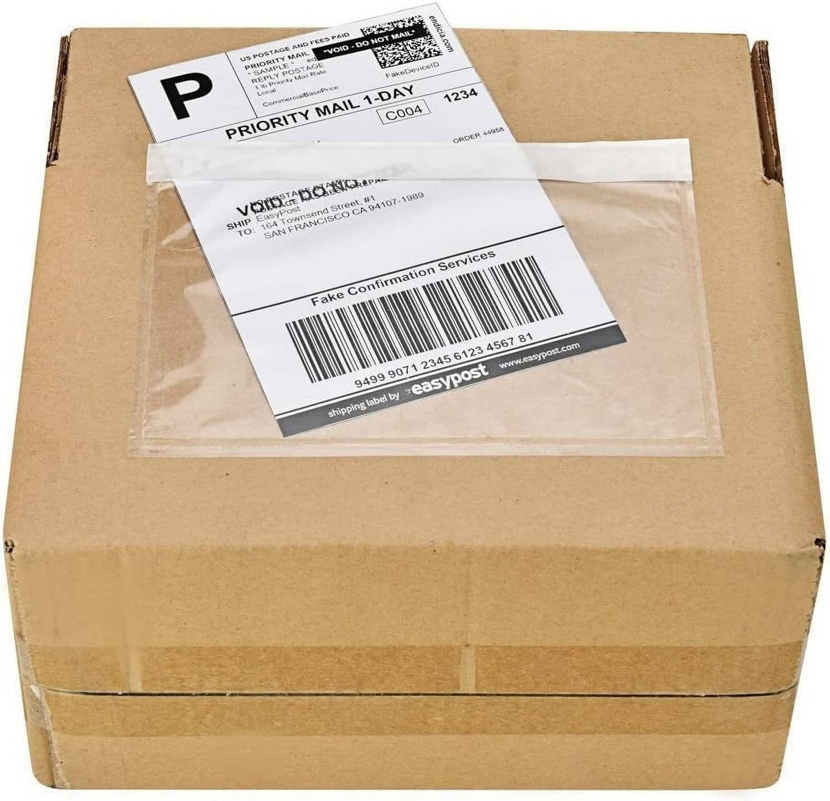 Clear adhesive top-loading packing list pouch on brown cardboard shipping box